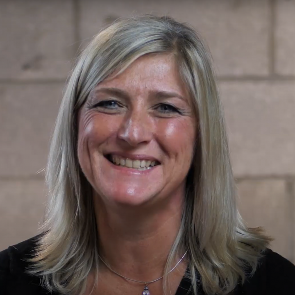 A smiling photo of Artist Renata Bradshaw